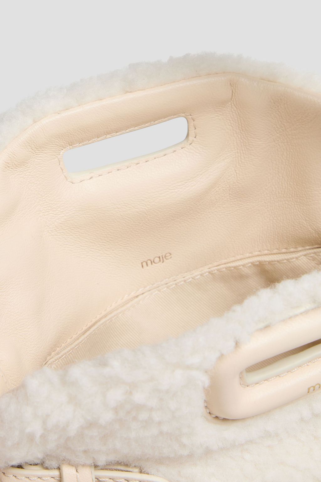 MAJE حقيبة كتف من صوف تيدي الناعم