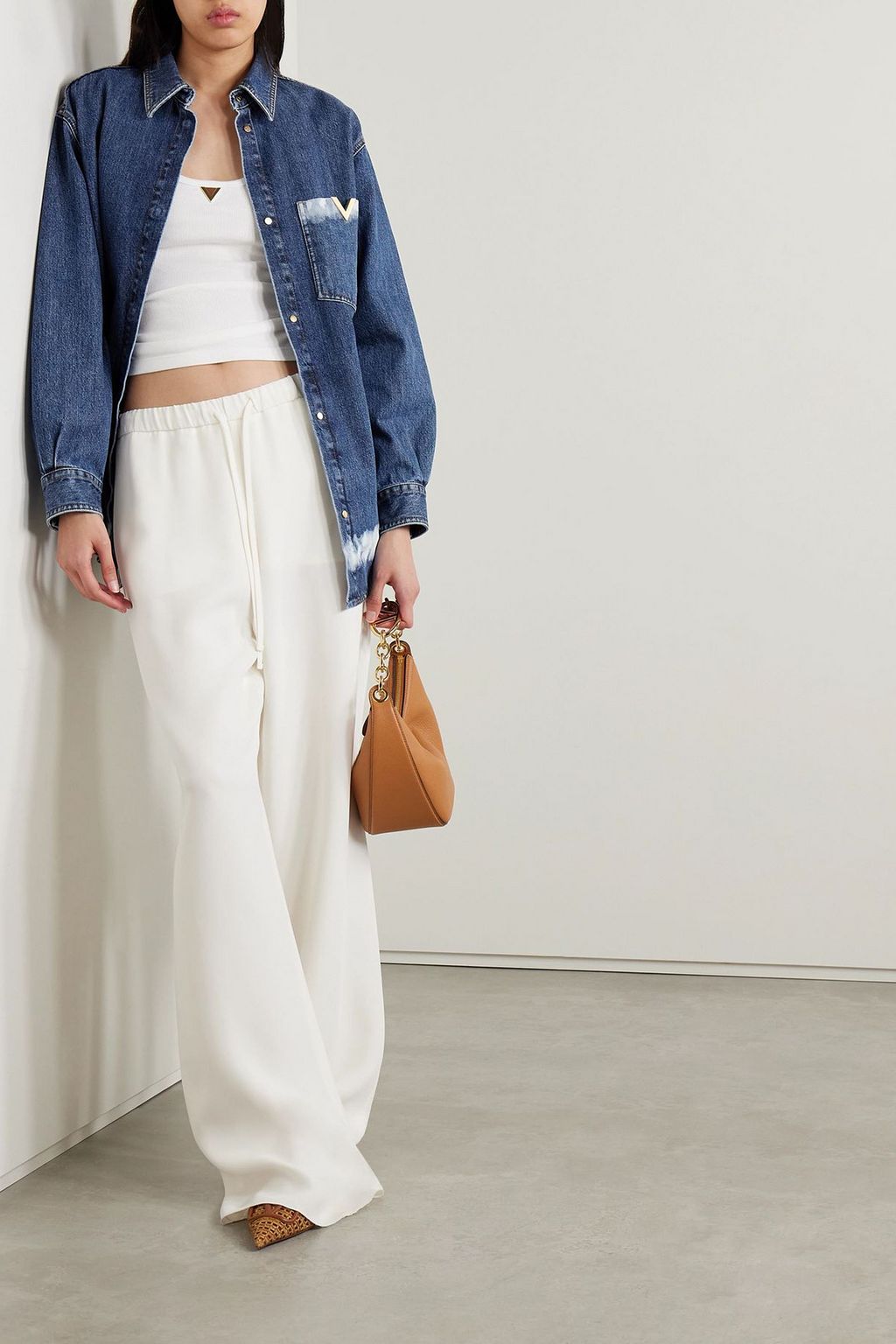 VALENTINO GARAVANI Oversized embellished bleached denim jacket