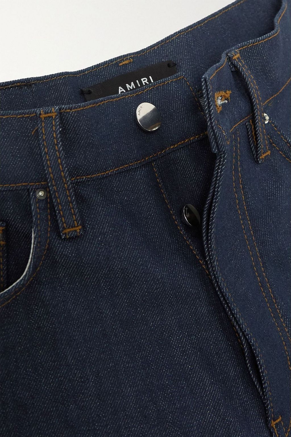 AMIRI بنطال جينز بخصر عالٍ وأرجل واسعة