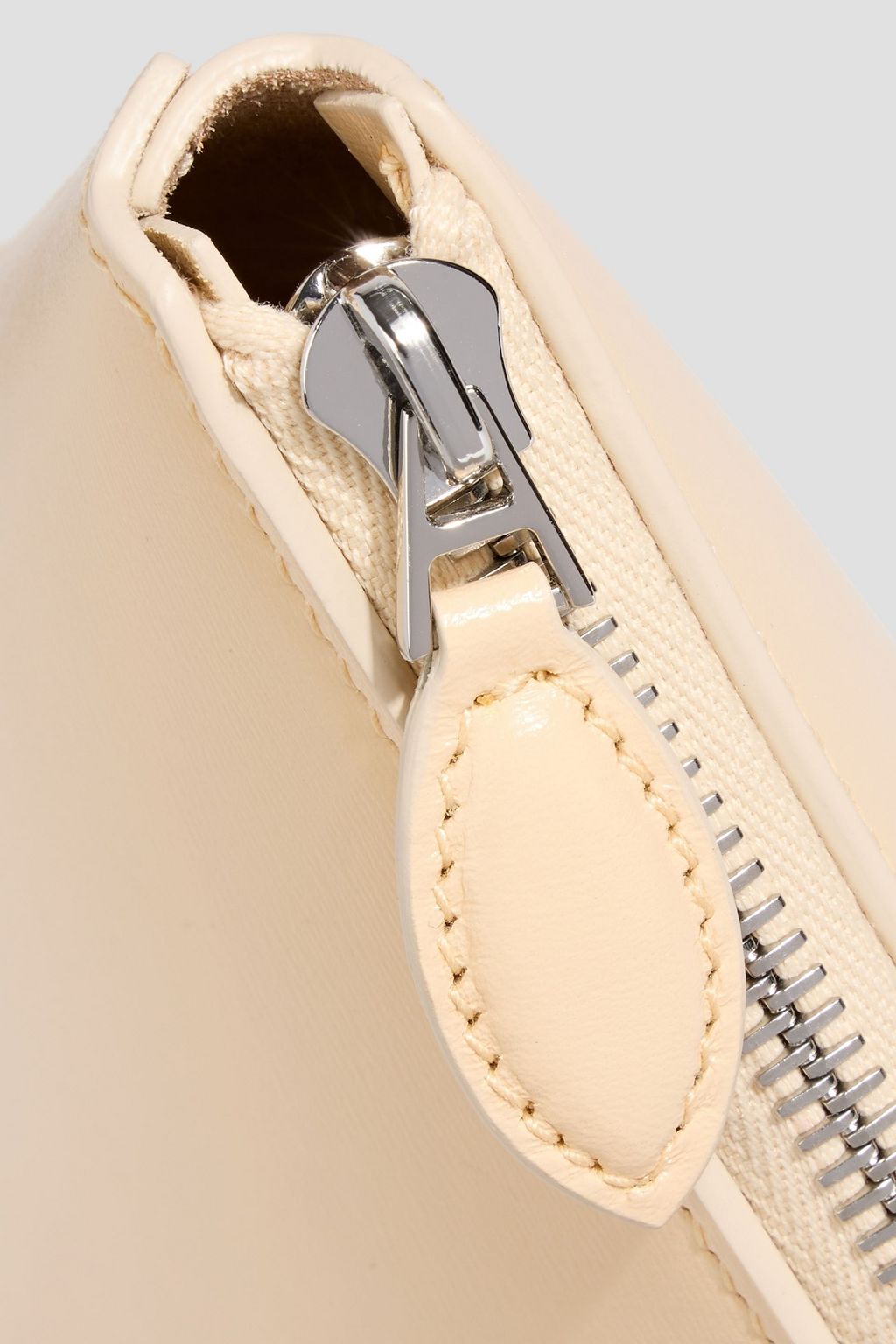 ALAÏA Folded leather clutch