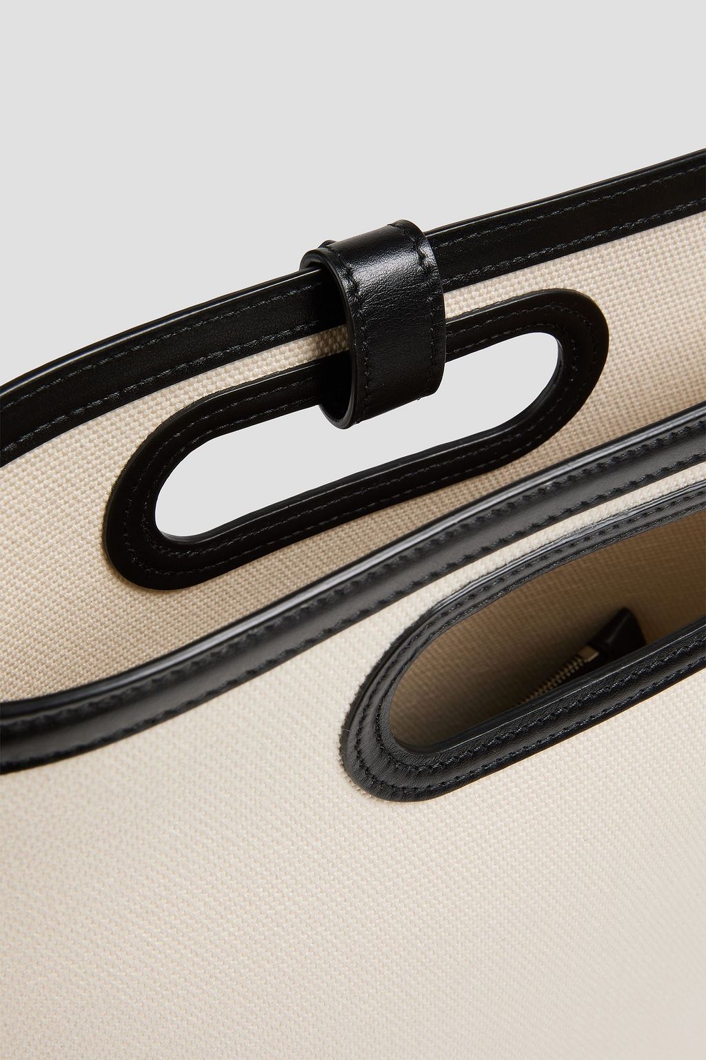 ALAÏA Folded leather-trimmed canvas tote