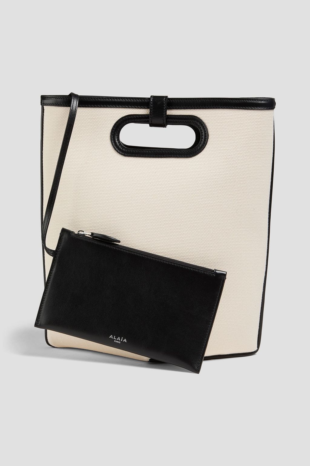ALAÏA Folded leather-trimmed canvas tote