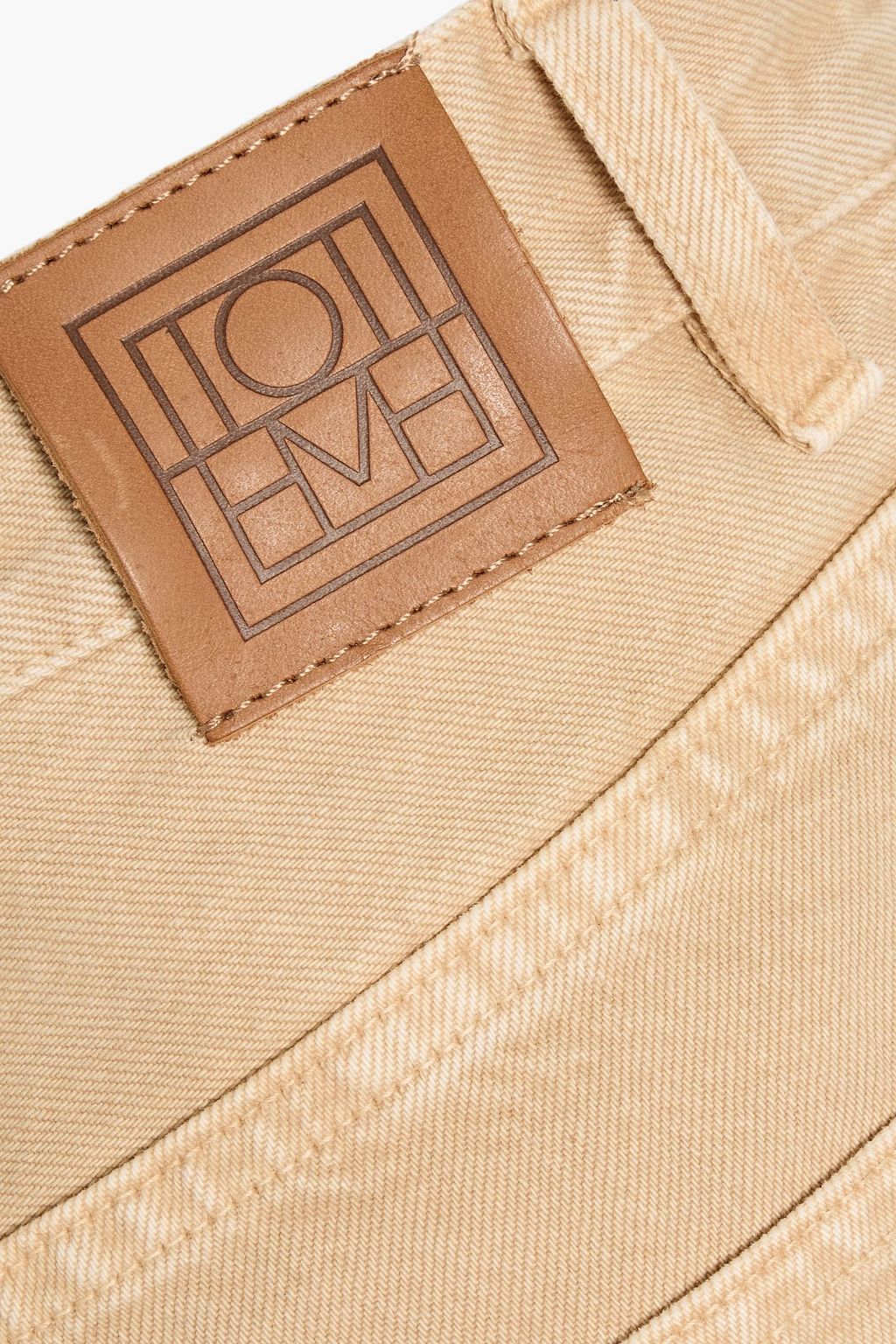 TOTEME High-rise tapered jeans