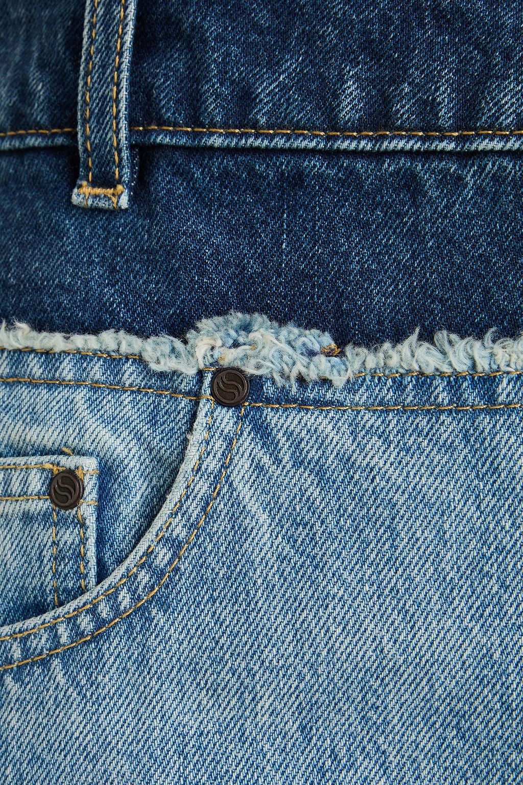 STELLA MCCARTNEY تنورة طويلة من الدنيم الباهت بحواف من قطع محاكة بجانب بعضها البعض