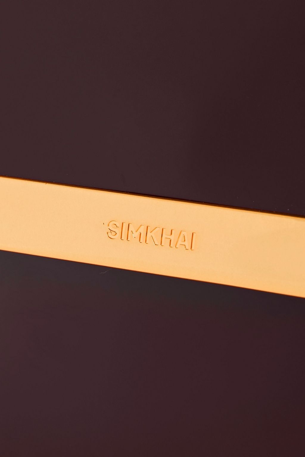 SIMKHAI Remy glossed-leather cross-body bag