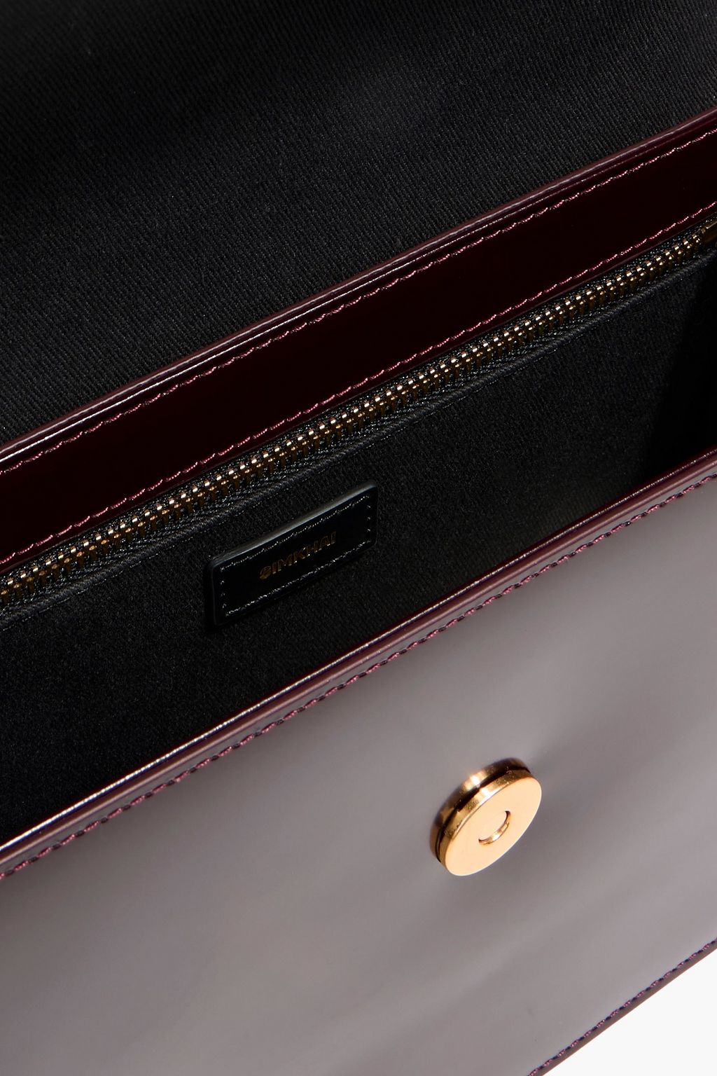 SIMKHAI Remy glossed-leather cross-body bag