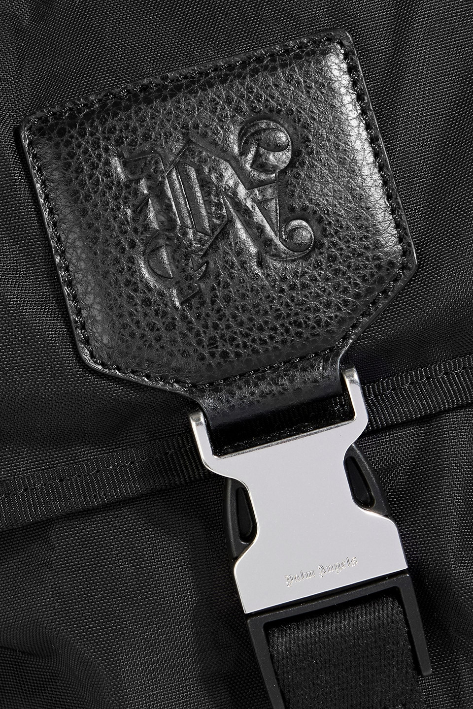Palm Angels Monogram-debossed Canvas Backpack In Black
