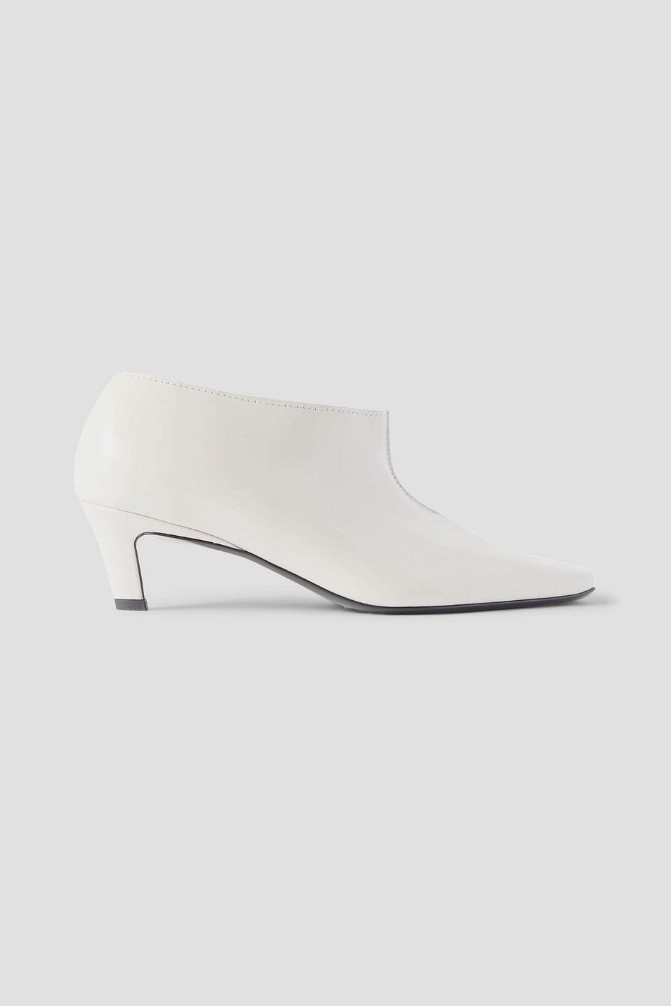 Totême The Wide Shaft Glossed-leather Ankle Boots In White
