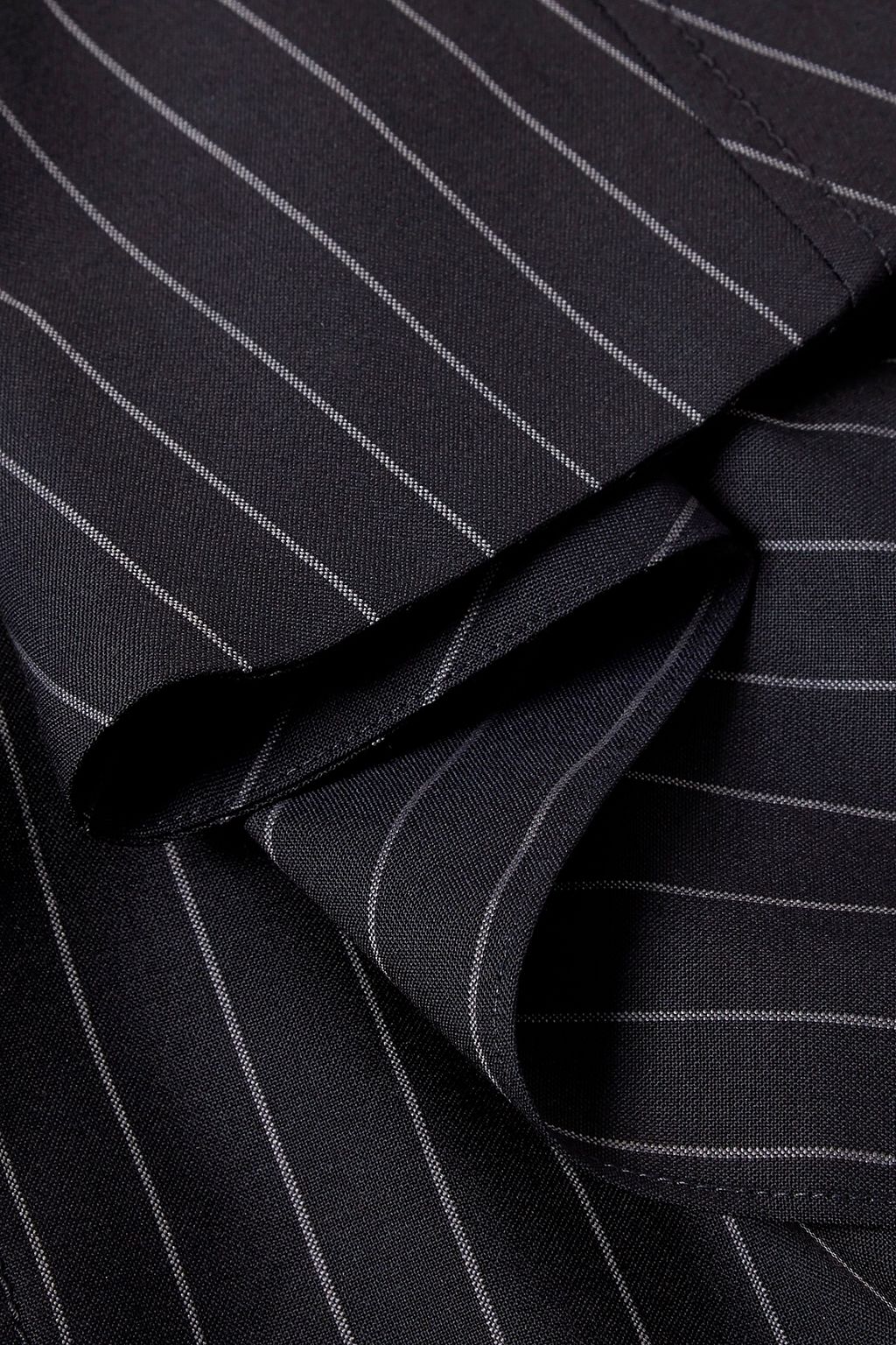 MONSE Asymmetric draped pinstriped wool-crepe top