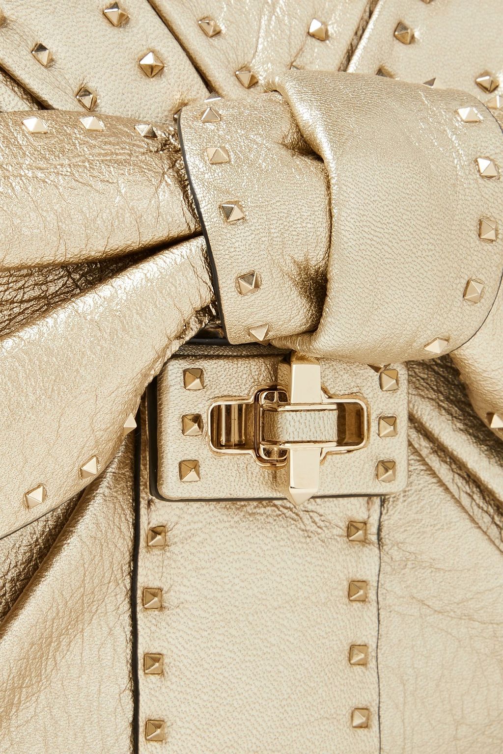 VALENTINO GARAVANI Bow-embellished metallic textured-leather shoulder bag
