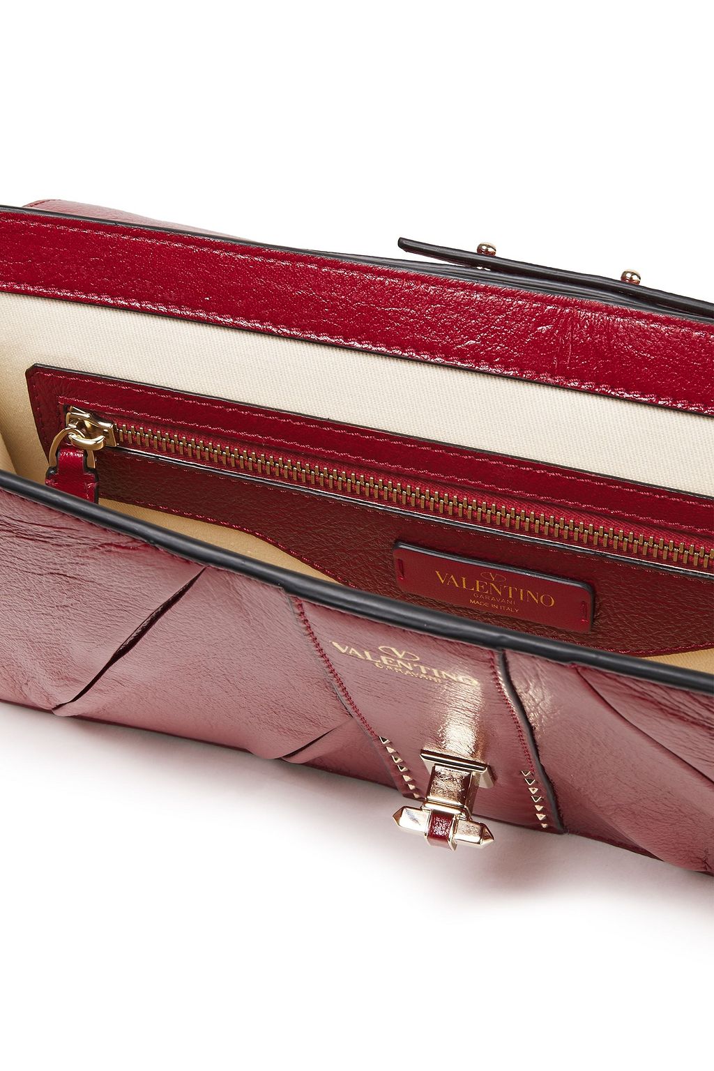VALENTINO GARAVANI Side Bow studded crinkled leather clutch