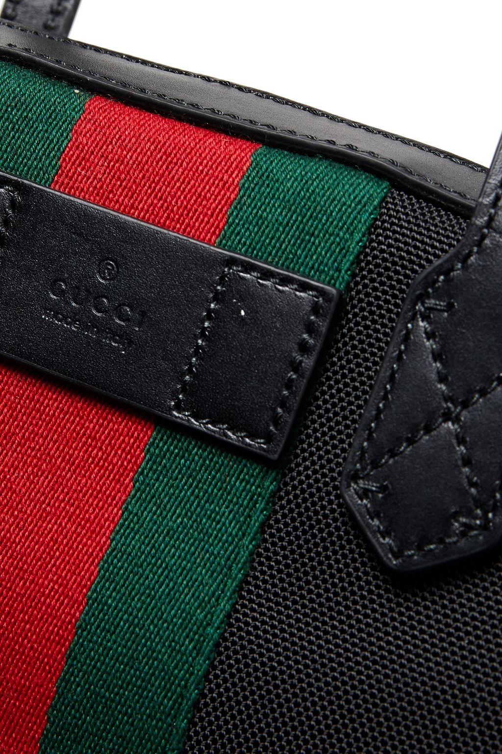 GUCCI Leather-trimmed canvas suitcase