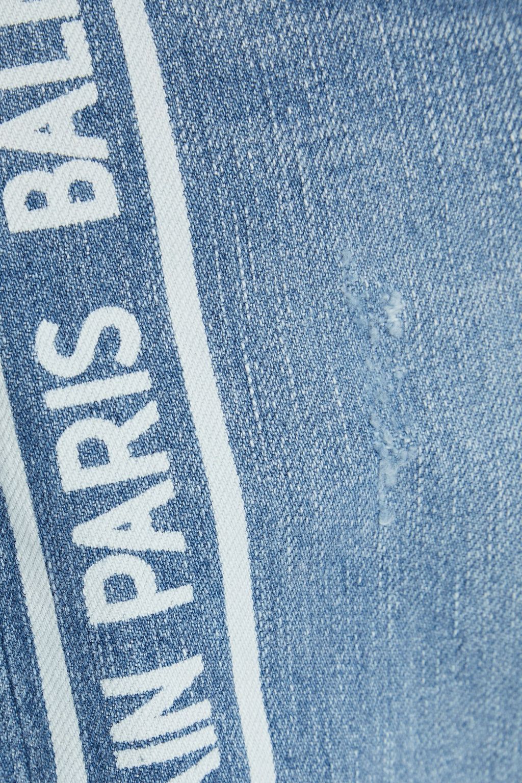 BALMAIN Distressed printed denim jeans