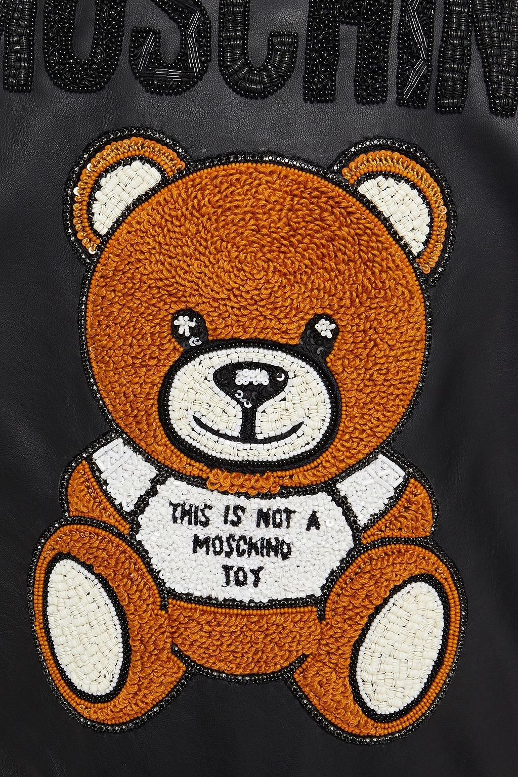 MOSCHINO Belted embellished leather vest